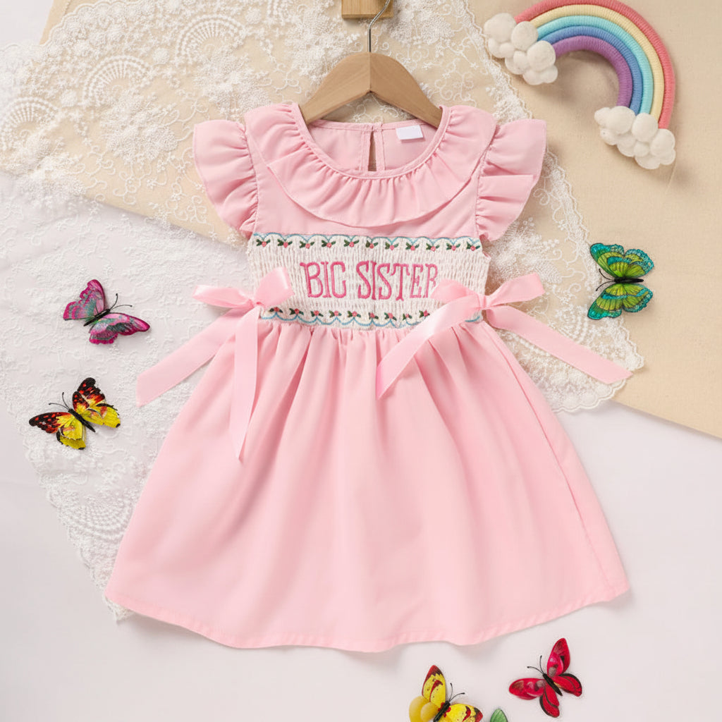 Toddler girl pink ruffle sleeve dress with bow detail